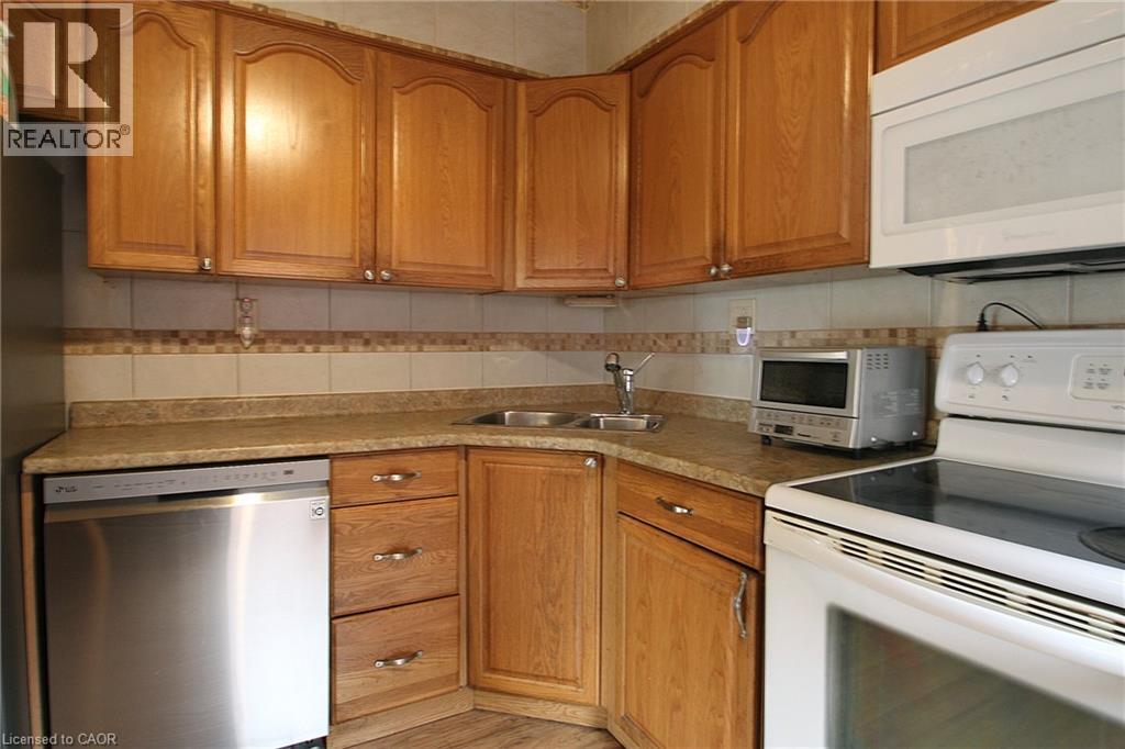35 Barons Avenue S, Hamilton, ON - Indoor Photo Showing Kitchen With Double Sink