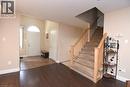 Welcoming foyer with arched transom window and dual closets anchors this home's entry - 509 Southridge Drive, Hamilton, ON  - Indoor Photo Showing Other Room 
