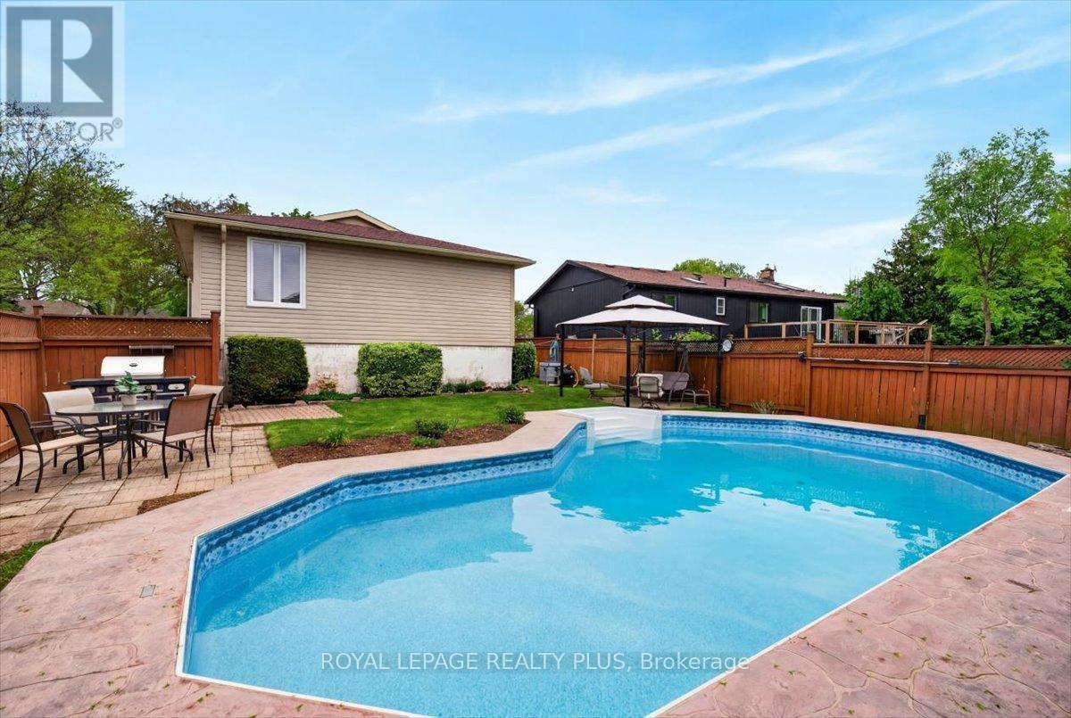 4452 Delaney Drive, Burlington, ON - Outdoor With In Ground Pool With Deck Patio Veranda With Backyard
