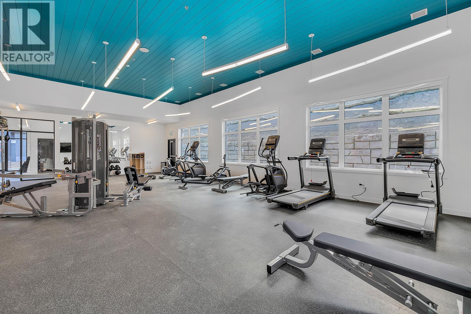 Gym Area - 1057 Frost Road Unit# 412, Kelowna, BC - Indoor Photo Showing Gym Room