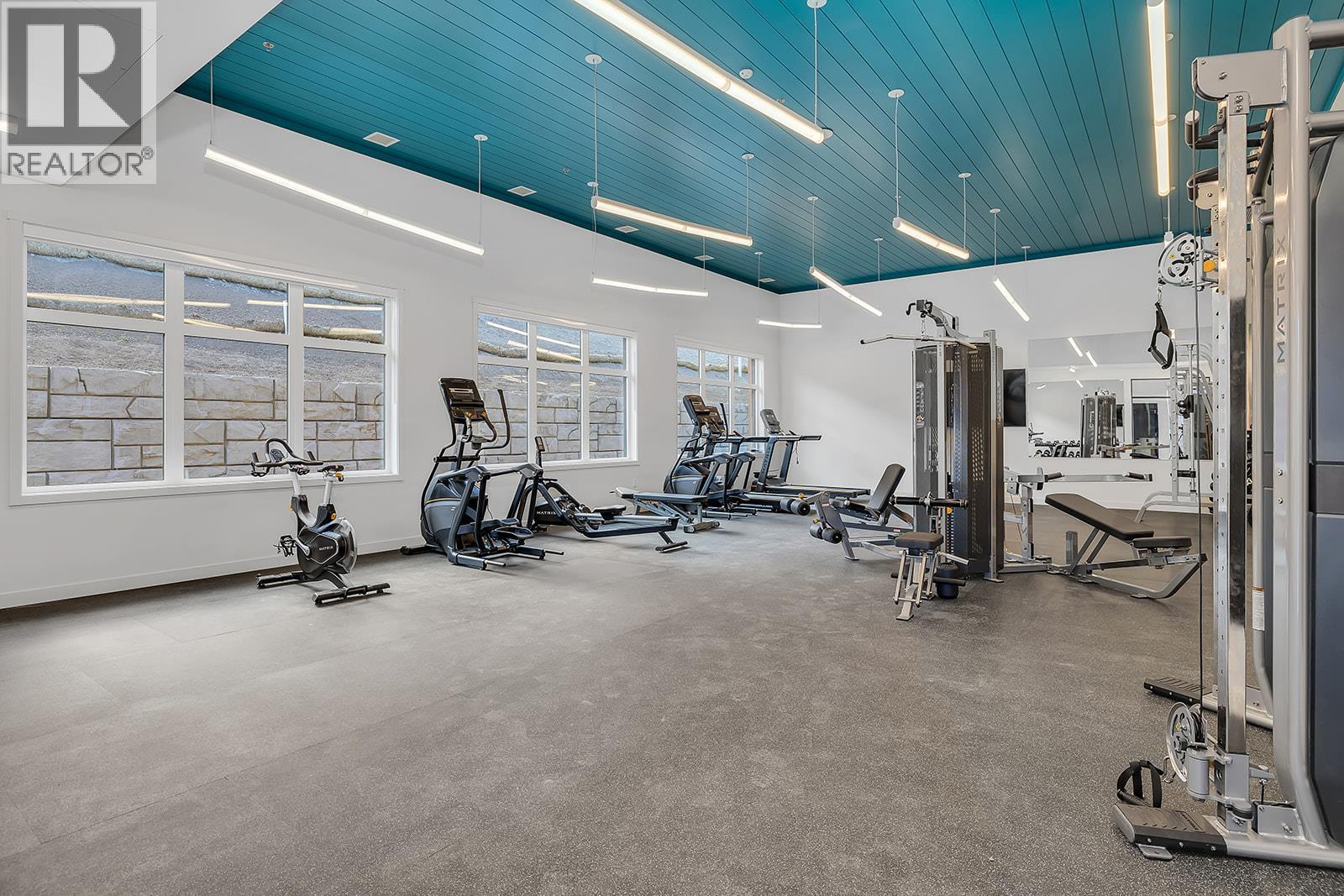 Gym Area - 1057 Frost Road Unit# 412, Kelowna, BC - Indoor Photo Showing Gym Room