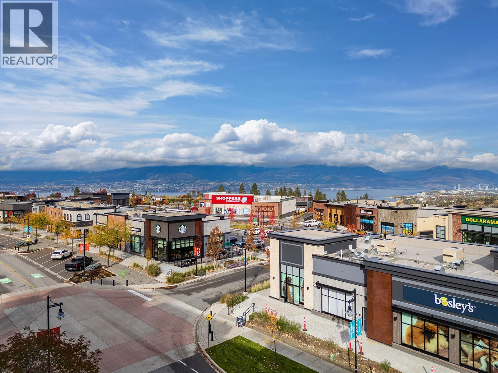 Across the street from Mission Village at the Ponds - 1057 Frost Road Unit# 412, Kelowna, BC - Outdoor With Body Of Water With View