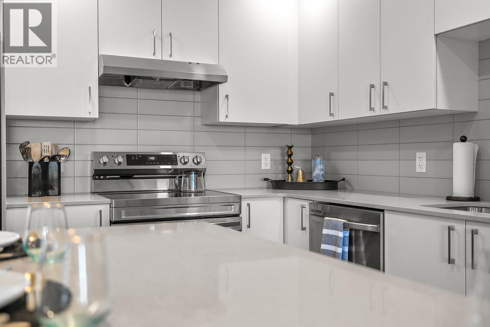 Photos are of a similar home; some features may vary - 1057 Frost Road Unit# 412, Kelowna, BC - Indoor Photo Showing Kitchen With Stainless Steel Kitchen With Upgraded Kitchen