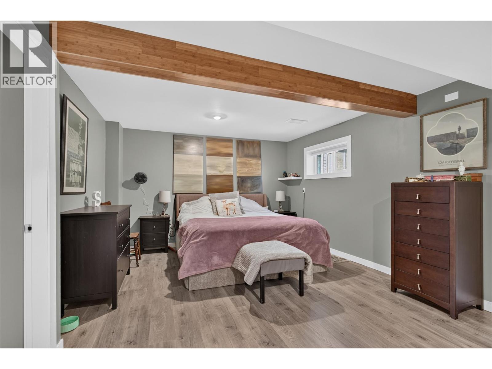 Spacious primary bedroom with plenty of room for a comfortable retreat. - 3703 Commonage Crescent, Vernon, BC - Indoor Photo Showing Bedroom