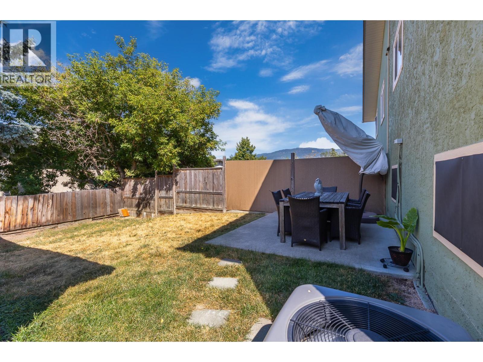 Private fenced backyard with plenty of space for relaxing and entertaining. - 3703 Commonage Crescent, Vernon, BC - Outdoor