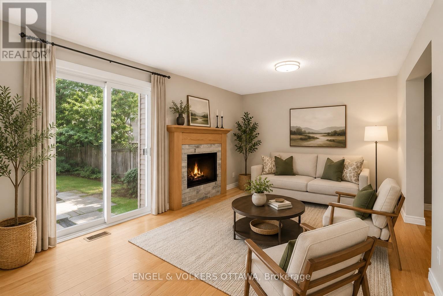 Family Room - Virtually Staged - 28 Weybridge Drive, Ottawa, ON - Indoor Photo Showing Living Room With Fireplace