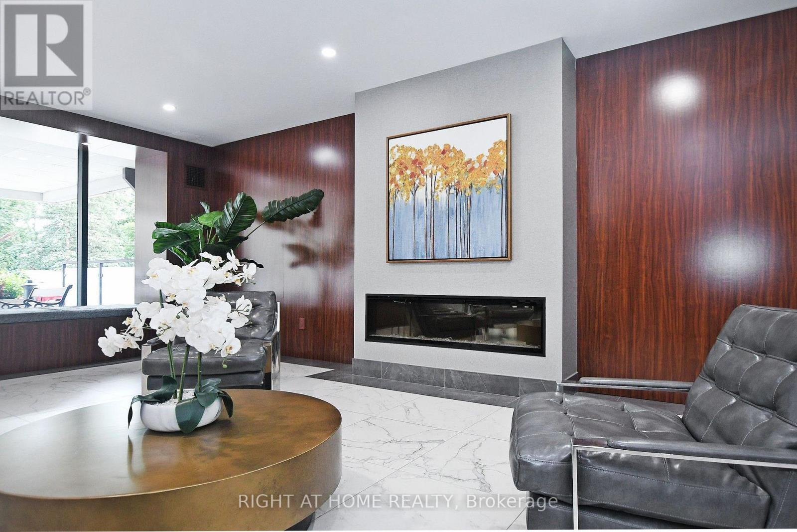 806 - 60 Inverlochy Boulevard, Markham, ON - Indoor Photo Showing Living Room With Fireplace