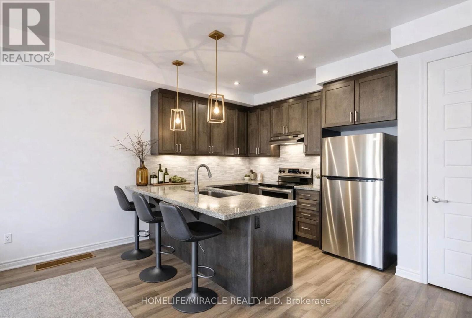 1587 Moira Crescent, Milton, ON - Indoor Photo Showing Kitchen With Stainless Steel Kitchen With Upgraded Kitchen