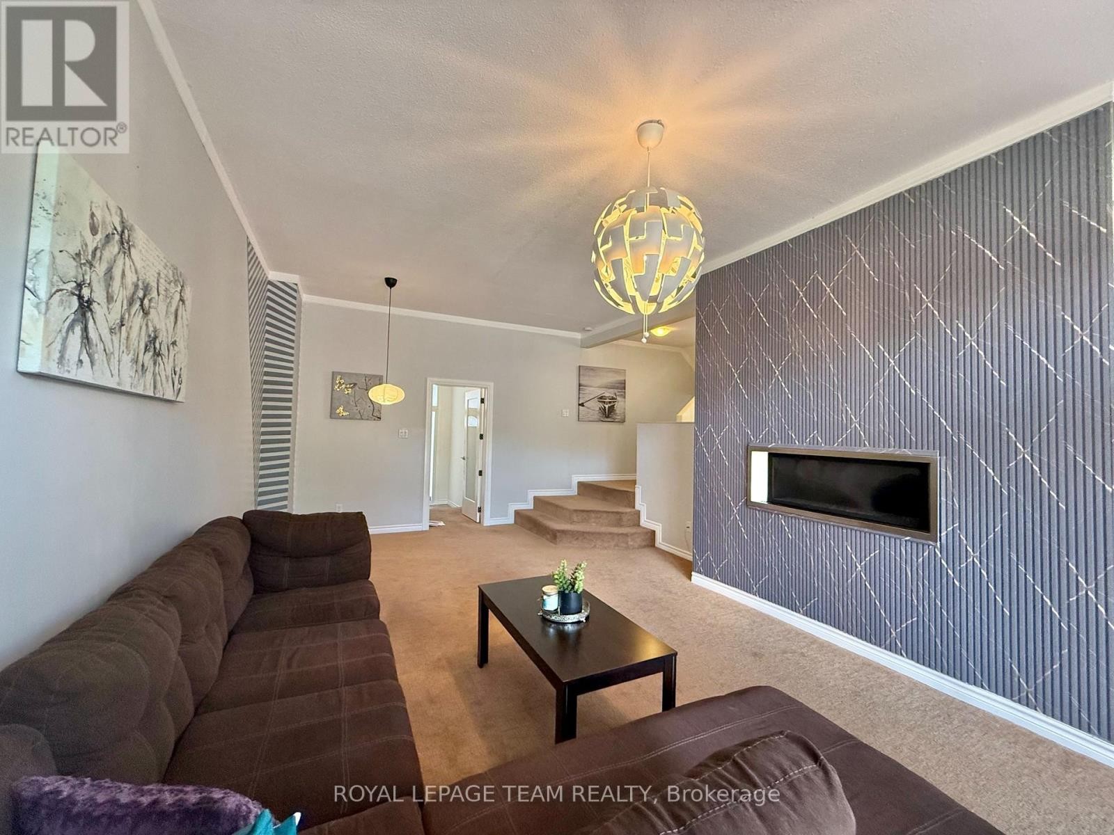 Living room has upgraded Fireplace - 31 Rastila Crescent, Ottawa, ON