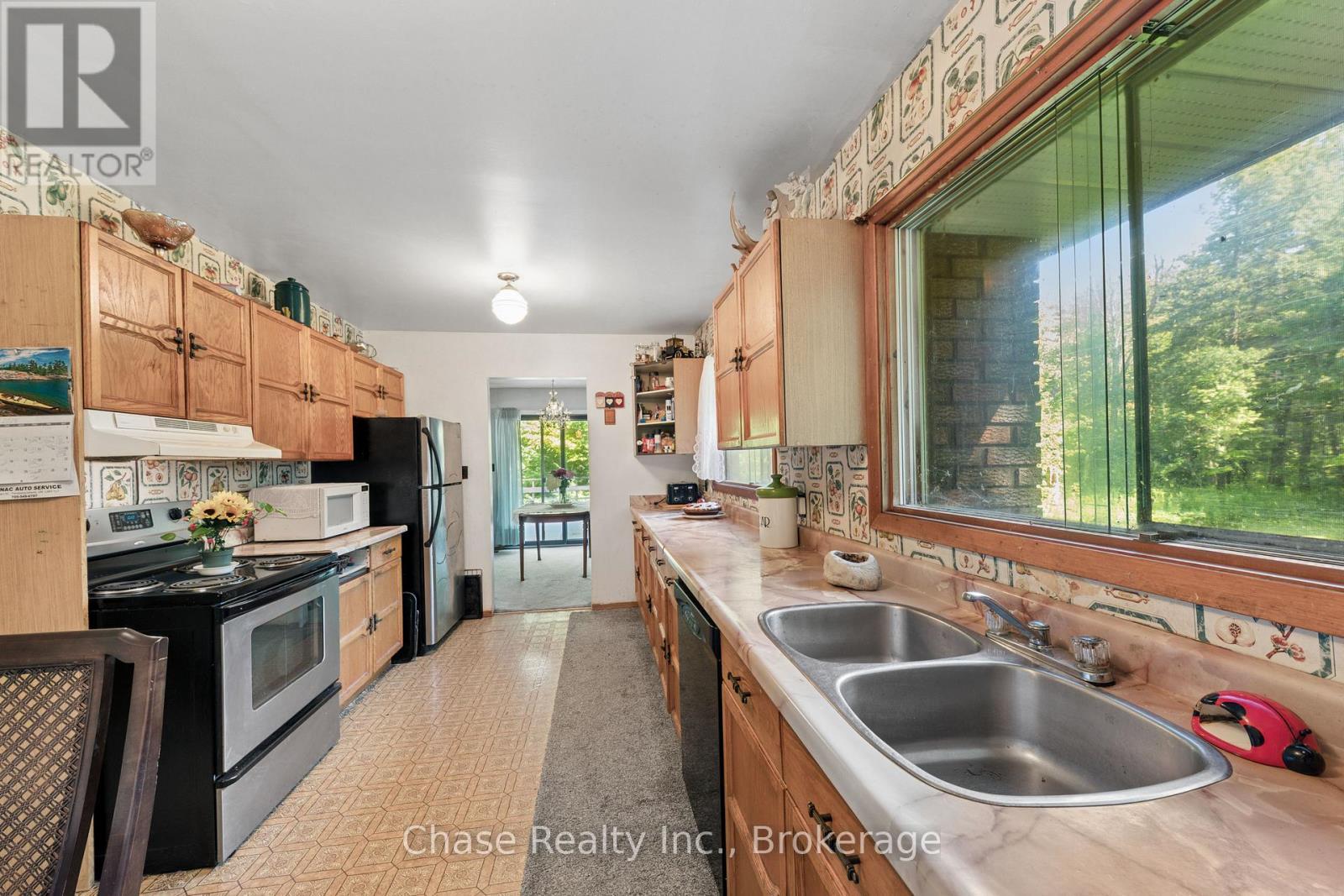 655 Tiny Beaches Road N, Tiny, ON - Indoor Photo Showing Kitchen With Double Sink
