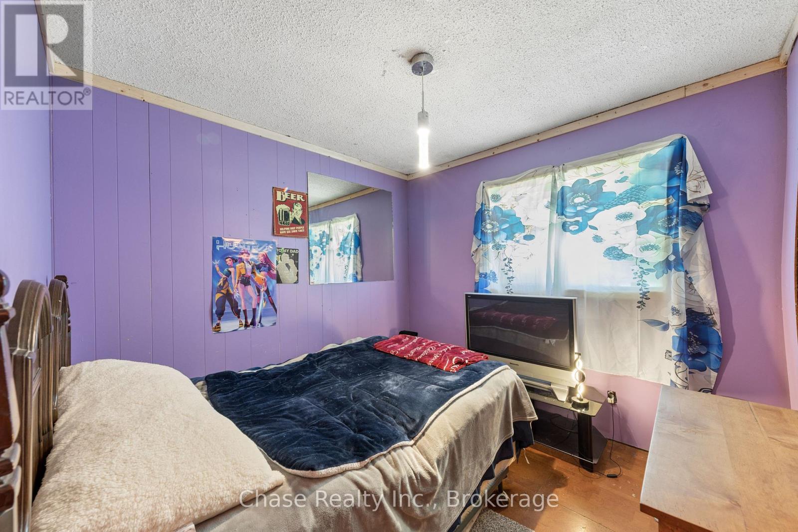 655 Tiny Beaches Road N, Tiny, ON - Indoor Photo Showing Bedroom