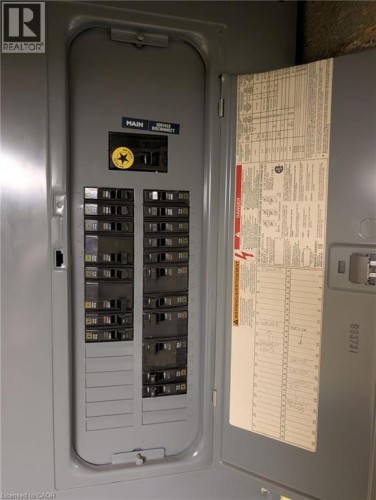 Hydro Panel at bottom of stairs in basement - 61 Barnesdale Avenue N, Hamilton, ON - Indoor Photo Showing Other Room