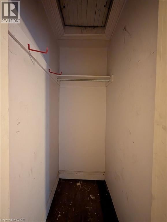 Walk-in Closet in Primary Bedroom. Access to Attic - 61 Barnesdale Avenue N, Hamilton, ON - Indoor