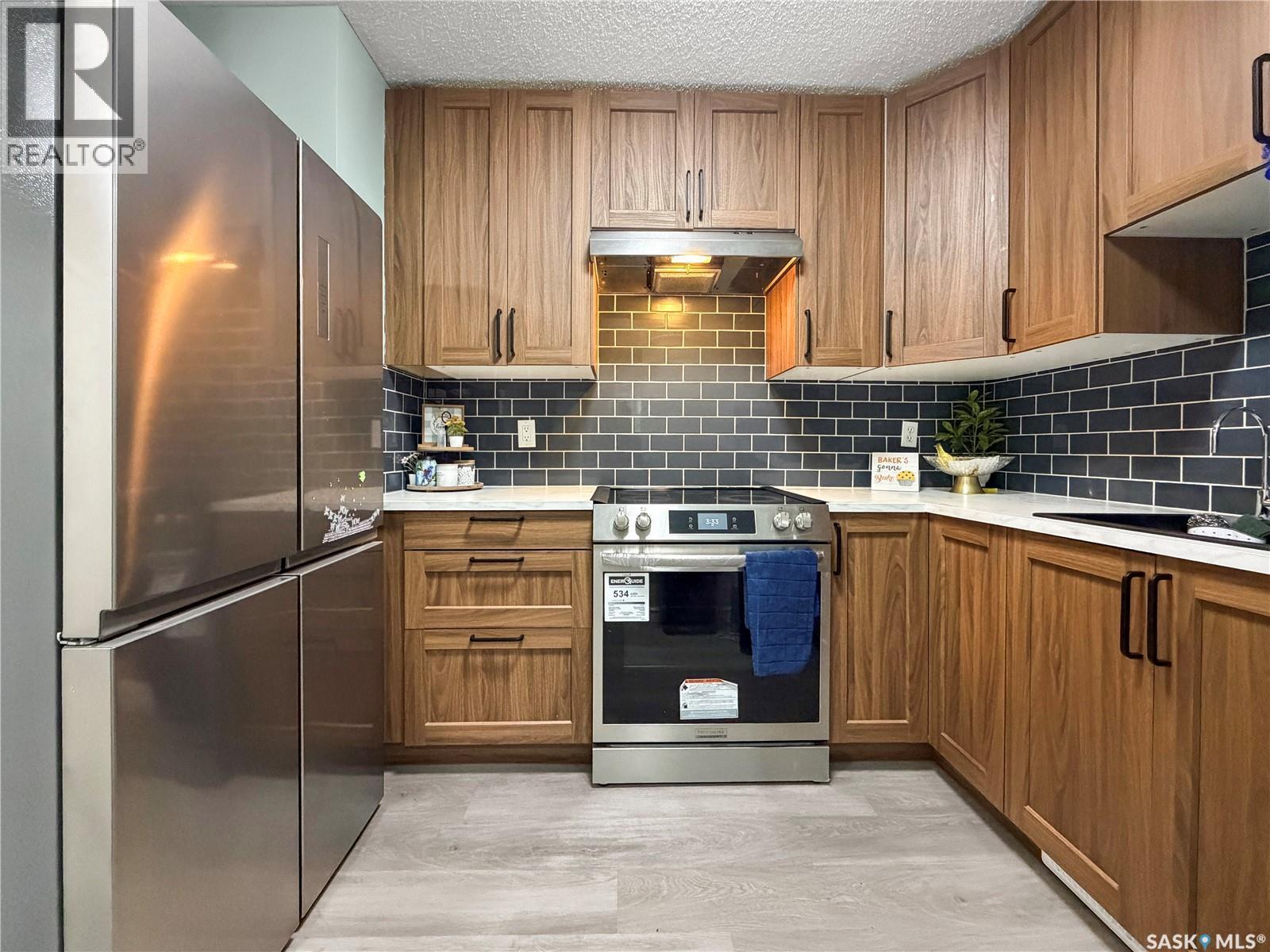 21 1128 Mckercher Drive, Saskatoon, SK - Indoor Photo Showing Kitchen