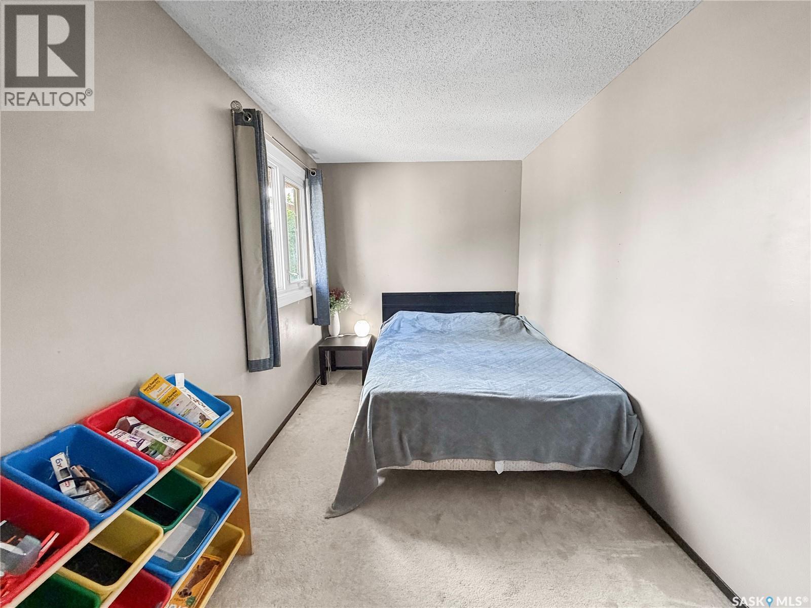 21 1128 Mckercher Drive, Saskatoon, SK - Indoor Photo Showing Bedroom