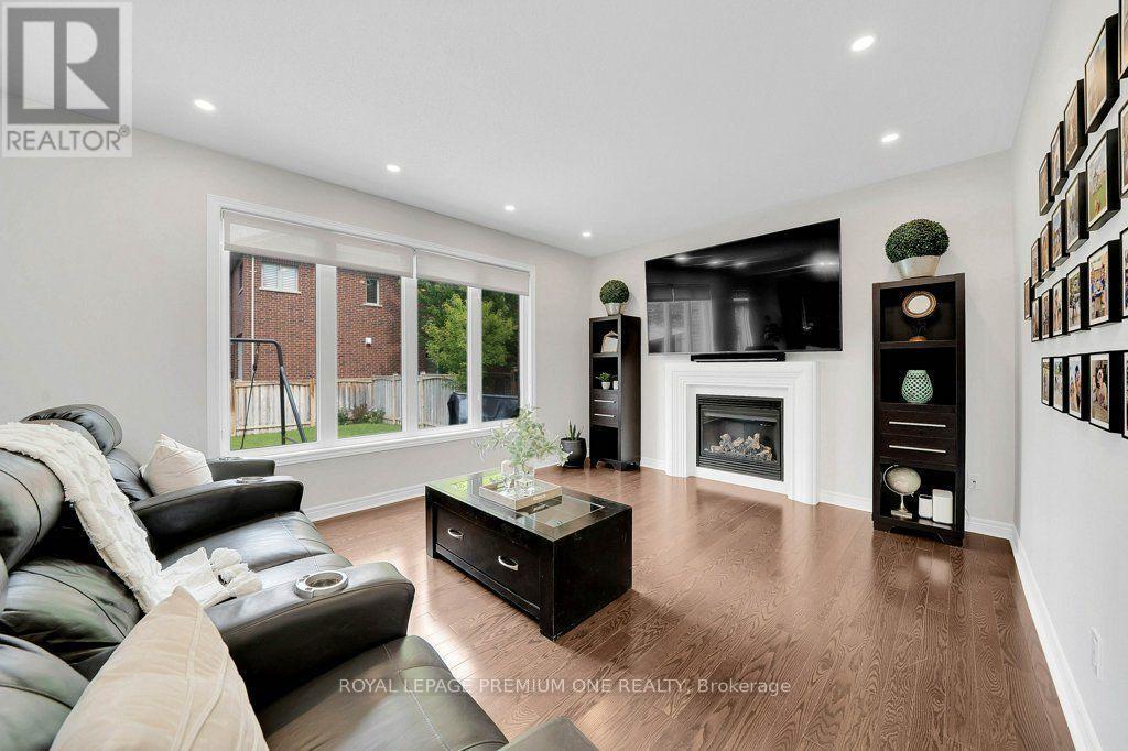 14 Atchison Drive, Caledon, ON - Indoor Photo Showing Living Room With Fireplace