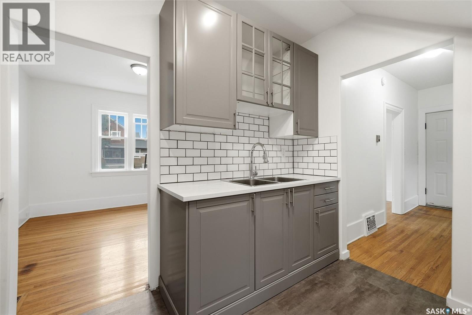 1209 14Th Avenue, Regina, SK - Indoor Photo Showing Kitchen With Double Sink