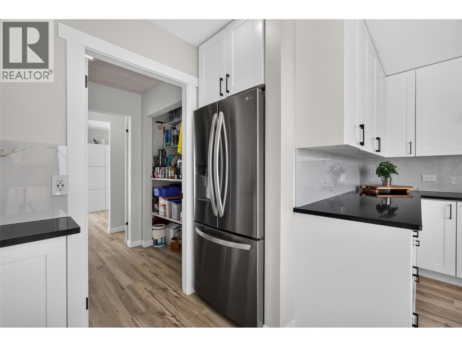 Large pantry nearby - 3491 Fenton Road, West Kelowna, BC - Indoor Photo Showing Other Room