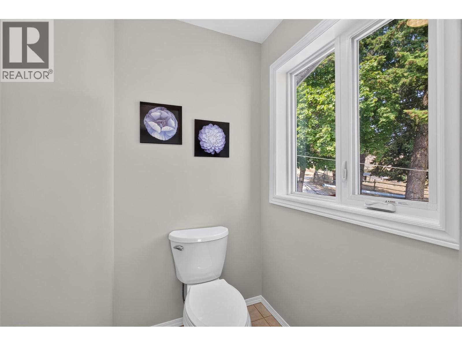 Primary ensuite with soaker tub & a walk-in shower - 3491 Fenton Road, West Kelowna, BC - Indoor Photo Showing Other Room