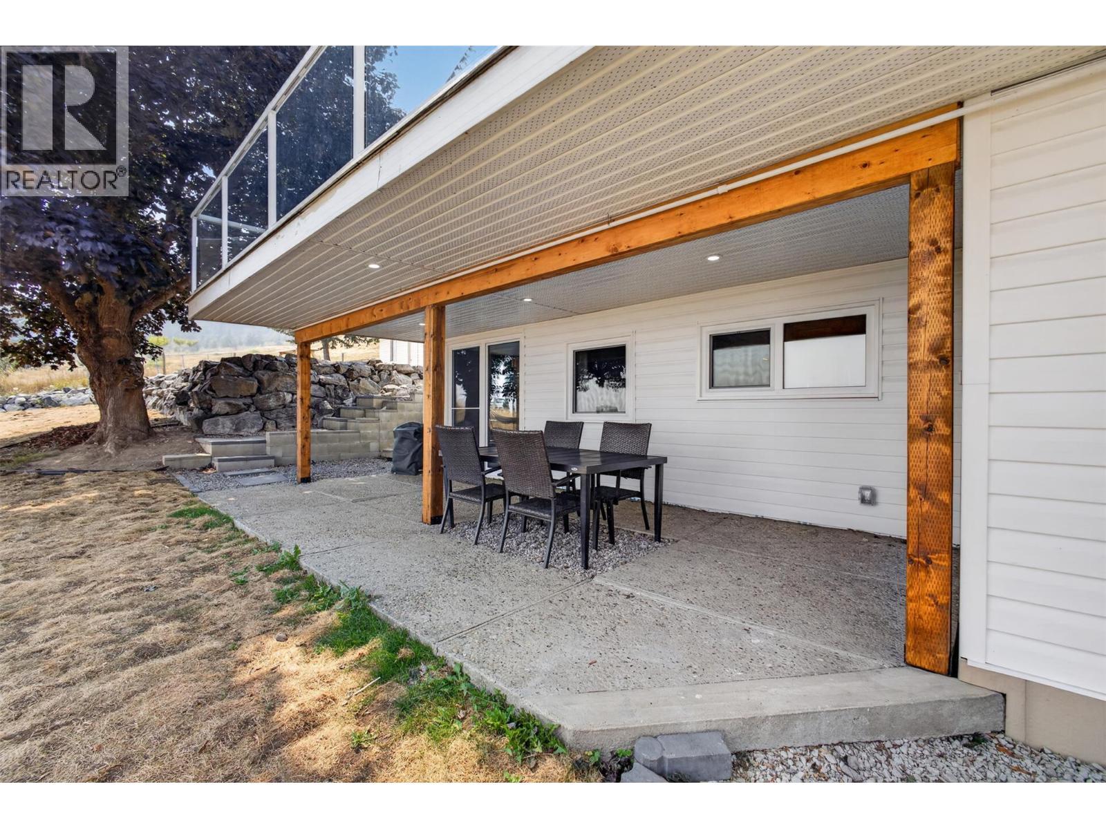 With a covered patio - 3491 Fenton Road, West Kelowna, BC - Outdoor With Deck Patio Veranda