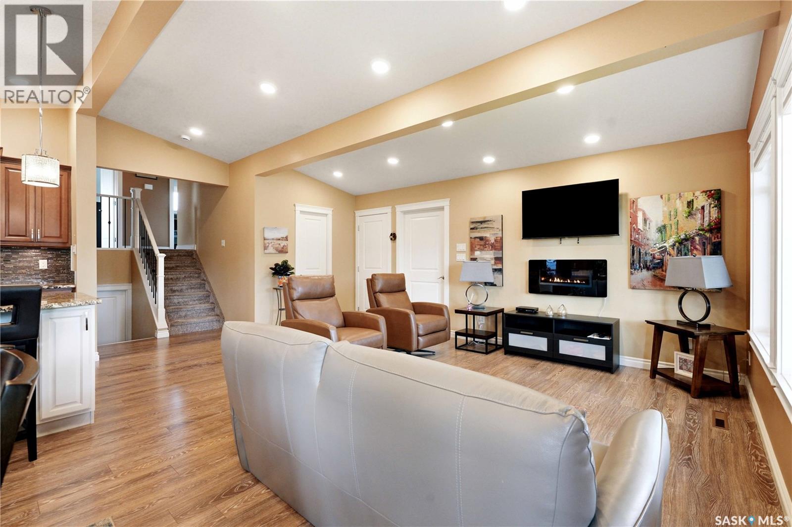 1710 Cameron Avenue, Saskatoon, SK - Indoor Photo Showing Living Room With Fireplace