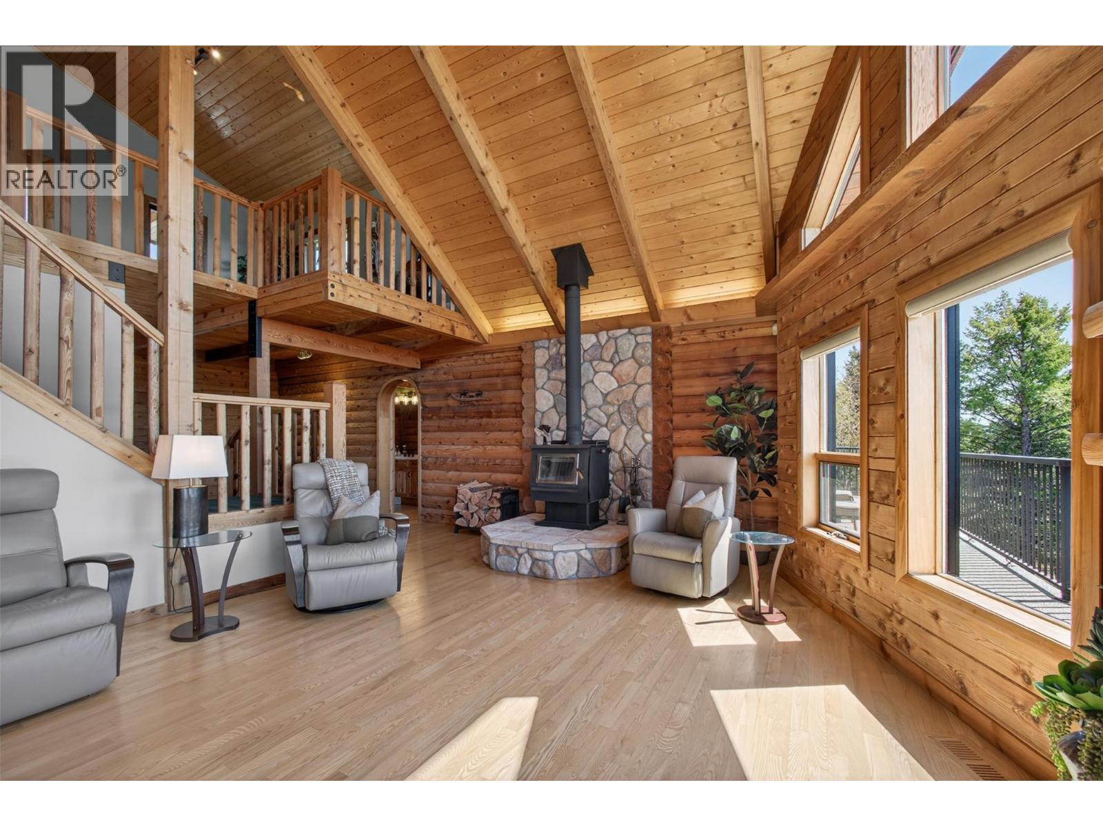 7319 Trapper Court, Kelowna, BC - Indoor With Fireplace