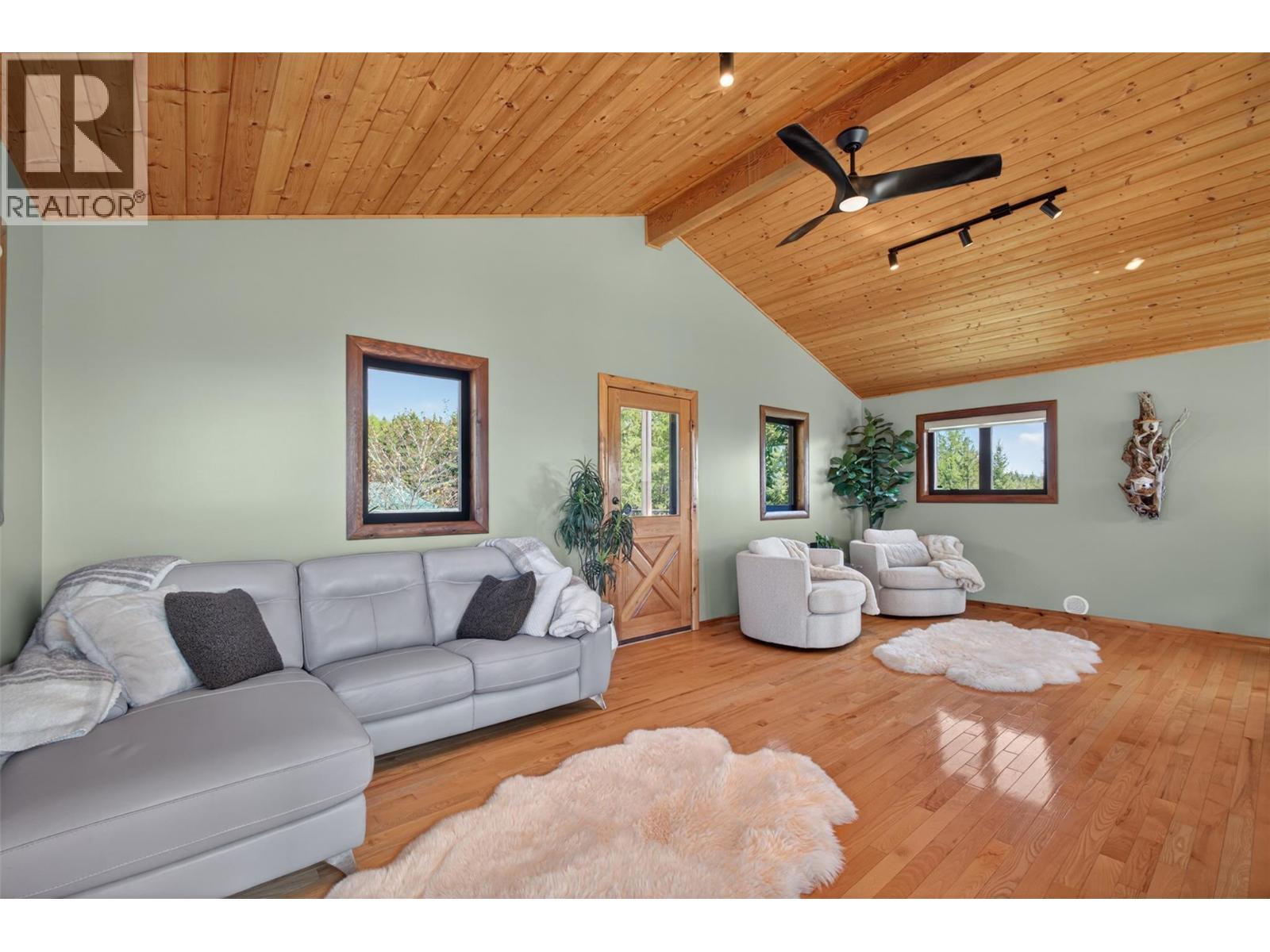 Loft with it's own patio - 7319 Trapper Court, Kelowna, BC - Indoor Photo Showing Living Room