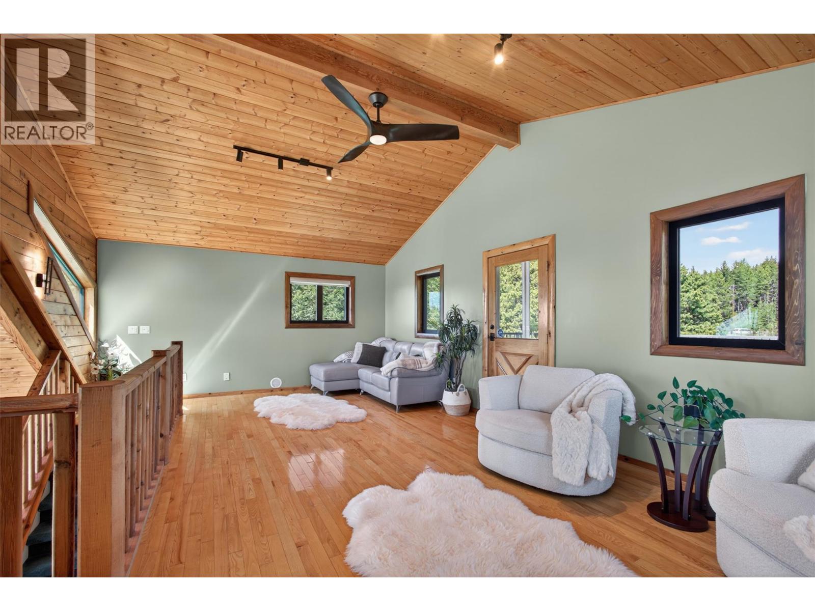 Loft with it's own patio - 7319 Trapper Court, Kelowna, BC - Indoor Photo Showing Living Room
