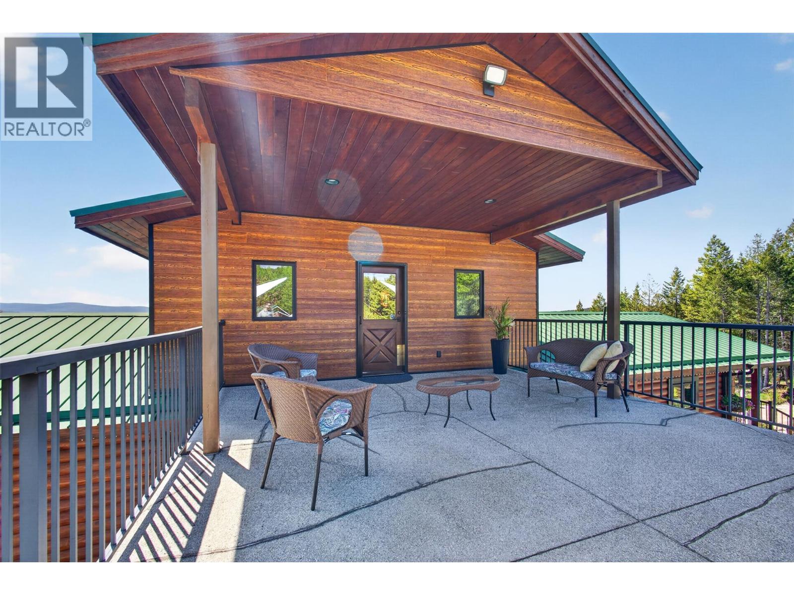 Front patio - 7319 Trapper Court, Kelowna, BC - Outdoor With Deck Patio Veranda With Exterior