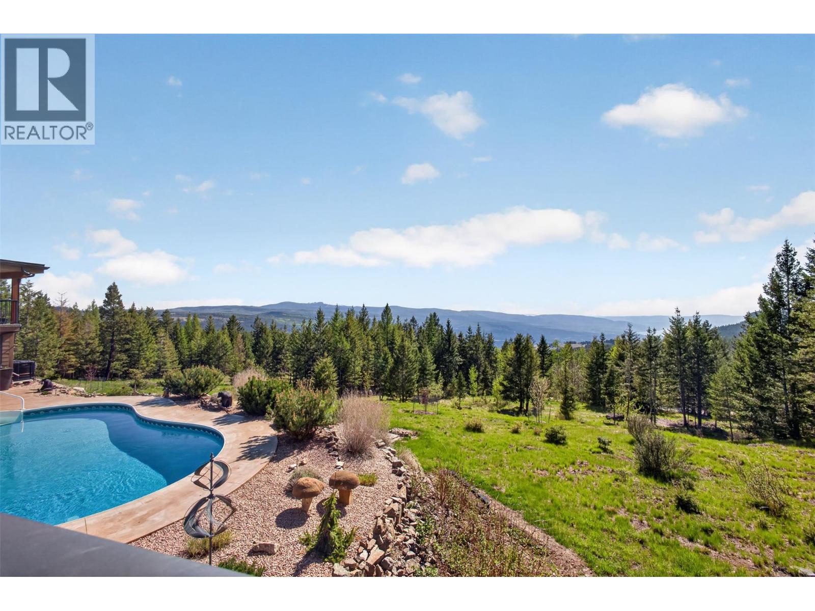 7319 Trapper Court, Kelowna, BC - Outdoor With In Ground Pool With View