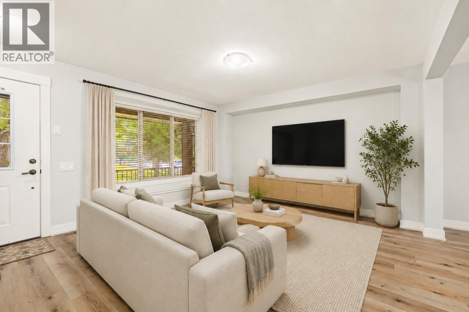 Digitally Staged Furniture, decor and window coverings. - 1651 Lynrick Road Unit# 105, Kelowna, BC - Indoor Photo Showing Living Room