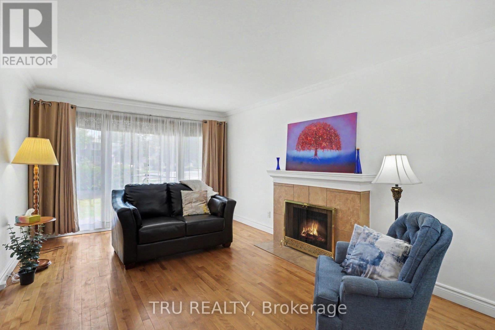 1908 Saunderson Drive, Ottawa, ON - Indoor Photo Showing Living Room With Fireplace