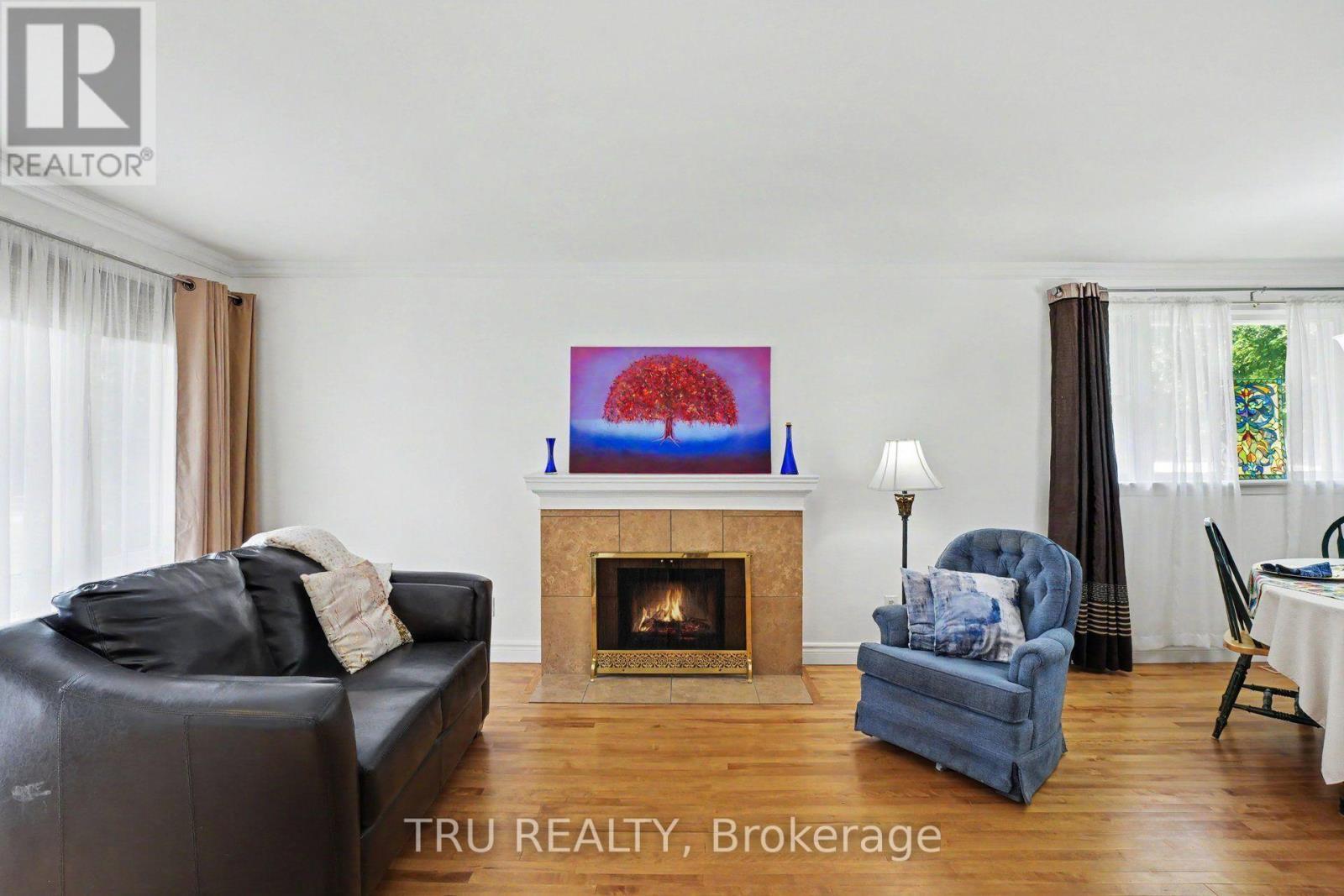 1908 Saunderson Drive, Ottawa, ON - Indoor Photo Showing Living Room With Fireplace