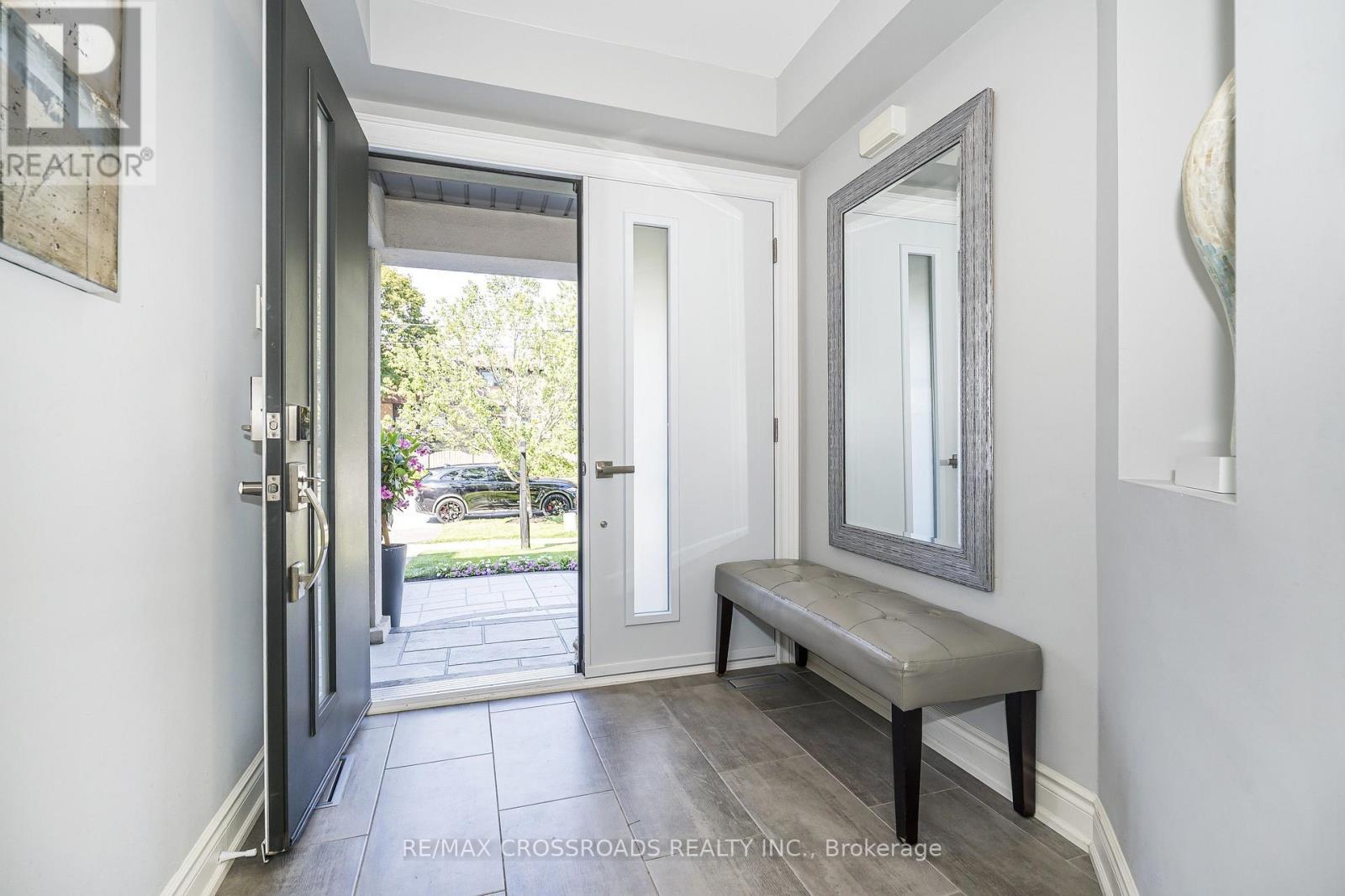 Custom Double Door & Porcelain Floor Entryway - 21A Brian Drive, Toronto, ON - Indoor Photo Showing Other Room