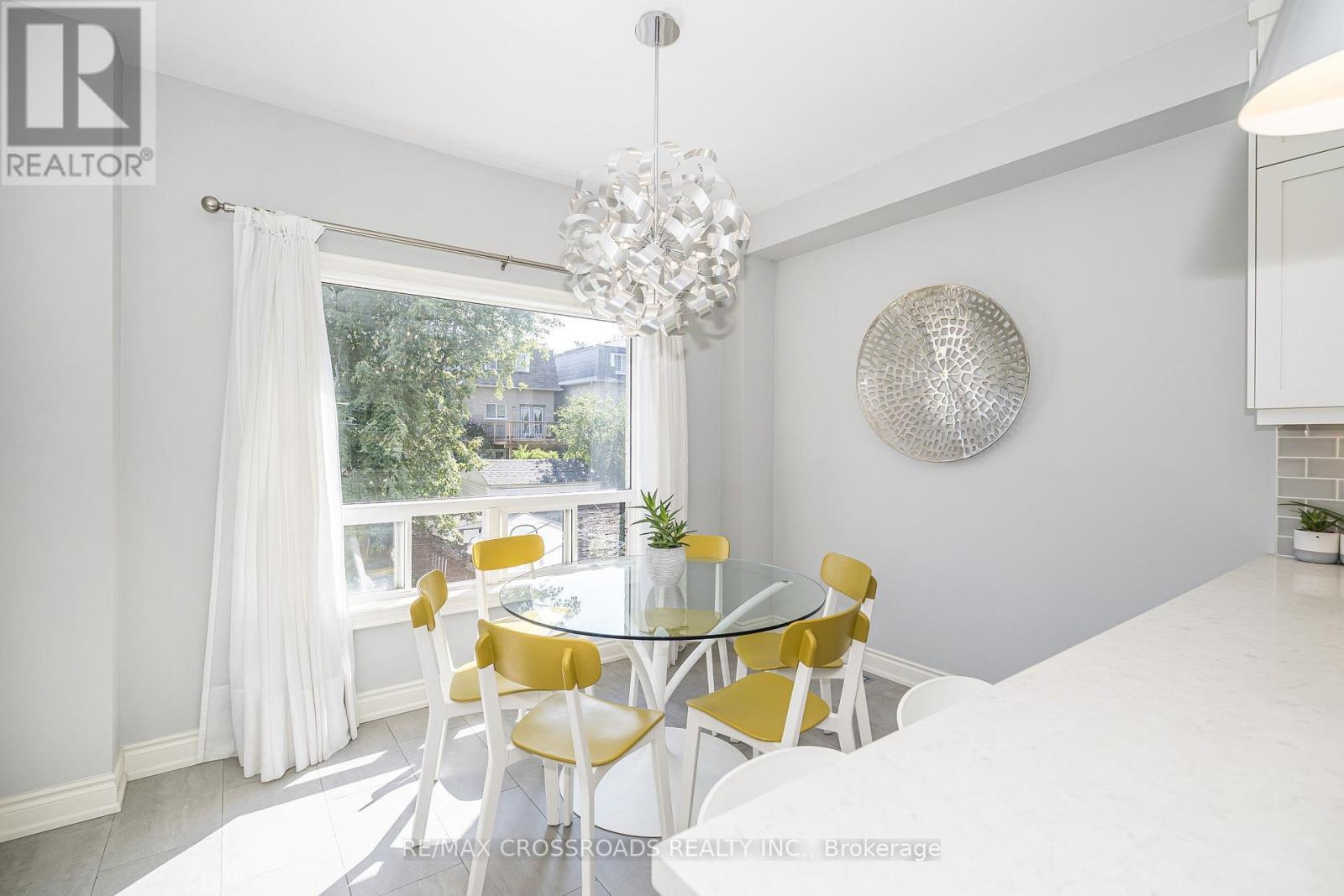Sunsoaked Breakfast Area Easily Seats 6-8 - 21A Brian Drive, Toronto, ON - Indoor Photo Showing Dining Room