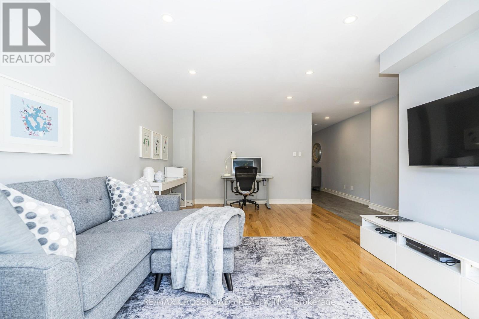 Main Floor Family Room - 21A Brian Drive, Toronto, ON - Indoor Photo Showing Living Room