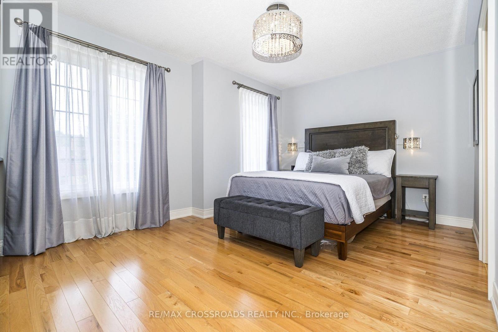 Gleaming Hardwood Flooring - 21A Brian Drive, Toronto, ON - Indoor Photo Showing Bedroom