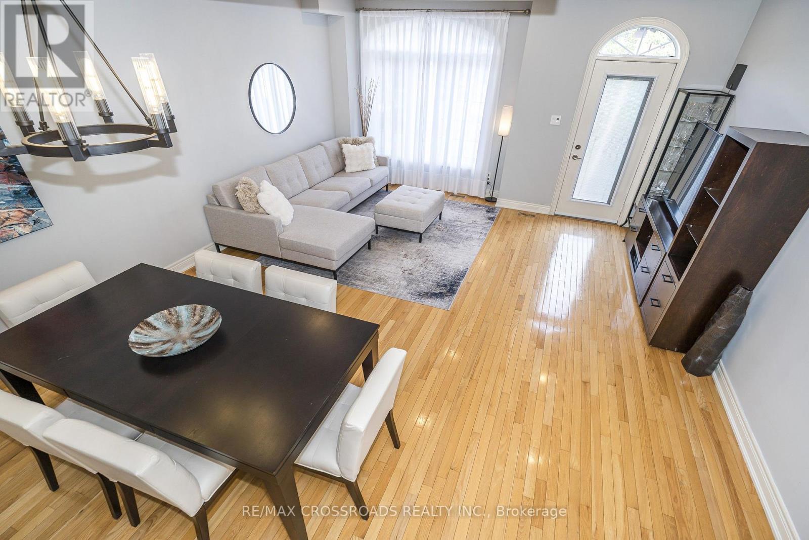 Huge Living and Dining Area With Gleaming Hardwood - 21A Brian Drive, Toronto, ON - Indoor Photo Showing Living Room