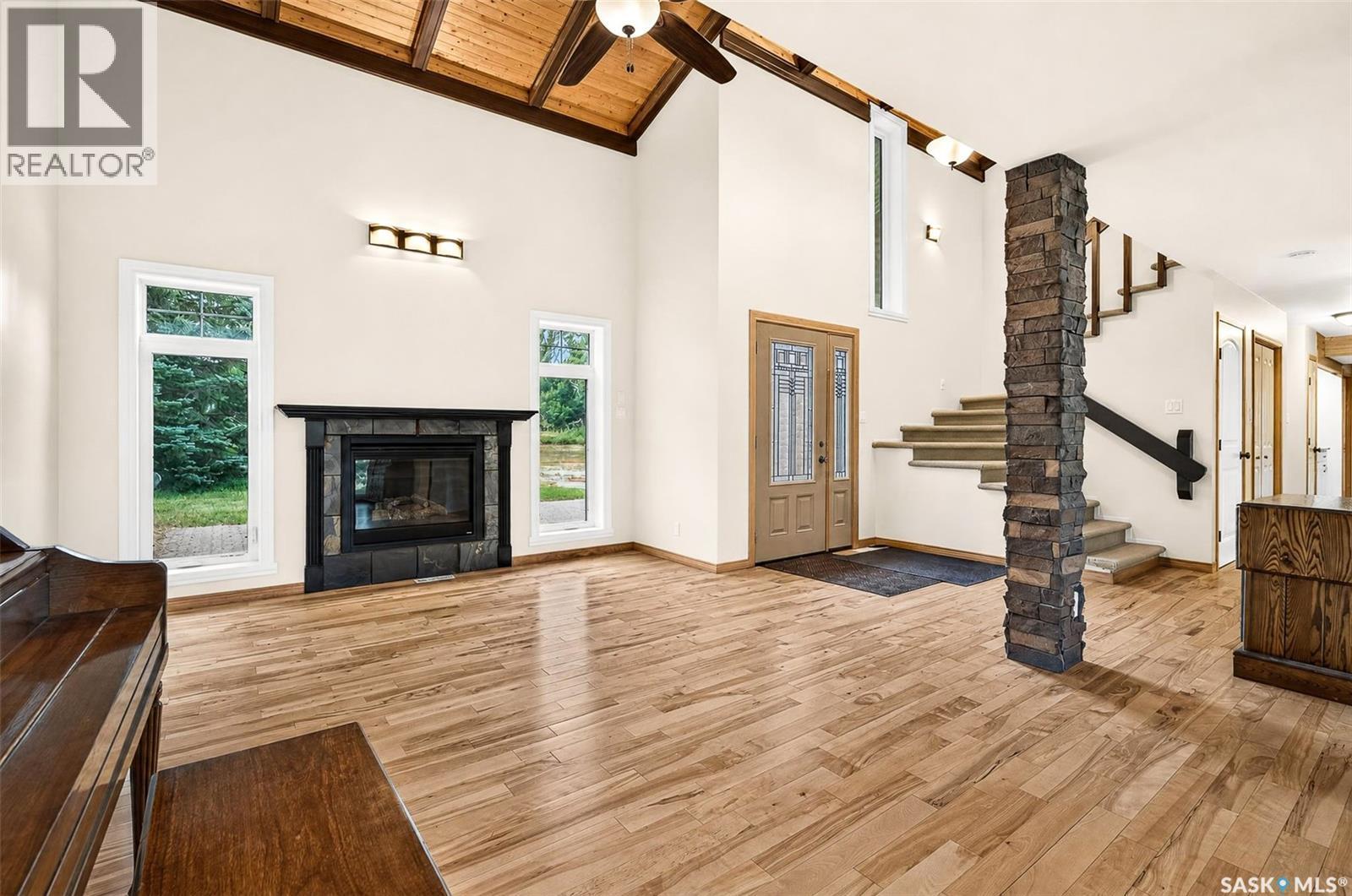 Campbell Acreage, Caron Rm No. 162, SK - Indoor Photo Showing Living Room With Fireplace