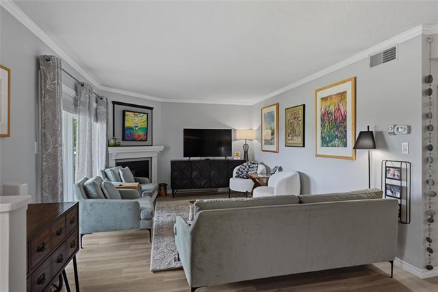 308-70 Dunkirk Dr, Winnipeg, MB - Indoor Photo Showing Living Room With Fireplace