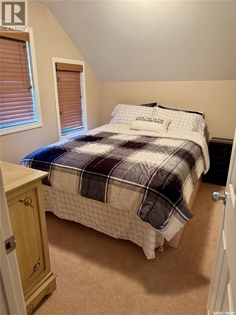 1561 Eagle Waskesiu Lake, Prince Albert National Park, SK - Indoor Photo Showing Bedroom
