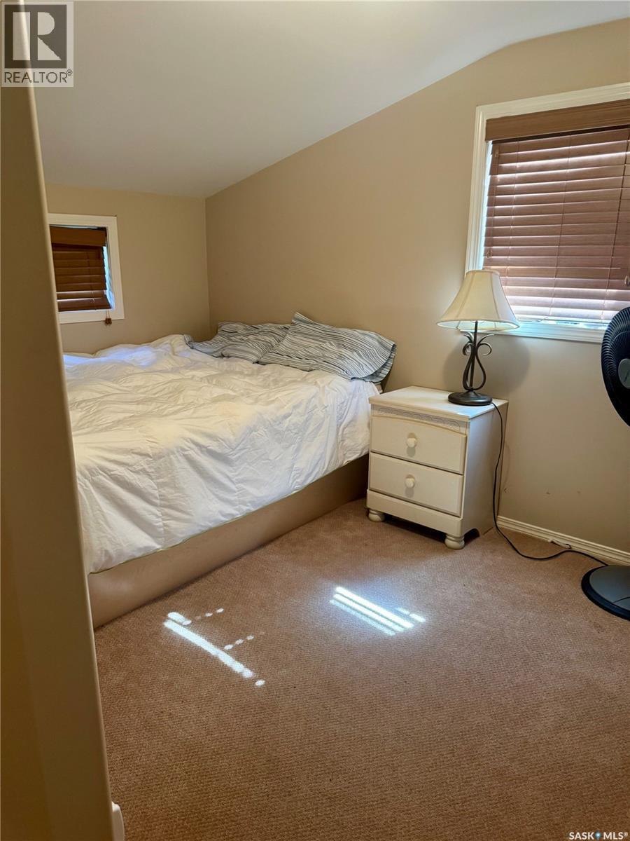 1561 Eagle Waskesiu Lake, Prince Albert National Park, SK - Indoor Photo Showing Bedroom
