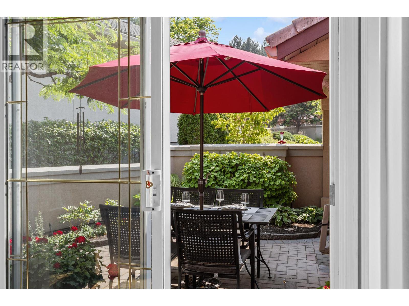 Peaceful courtyard. - 4400 Gallaghers Drive E Unit# 2, Kelowna, BC - Outdoor With Deck Patio Veranda With Exterior