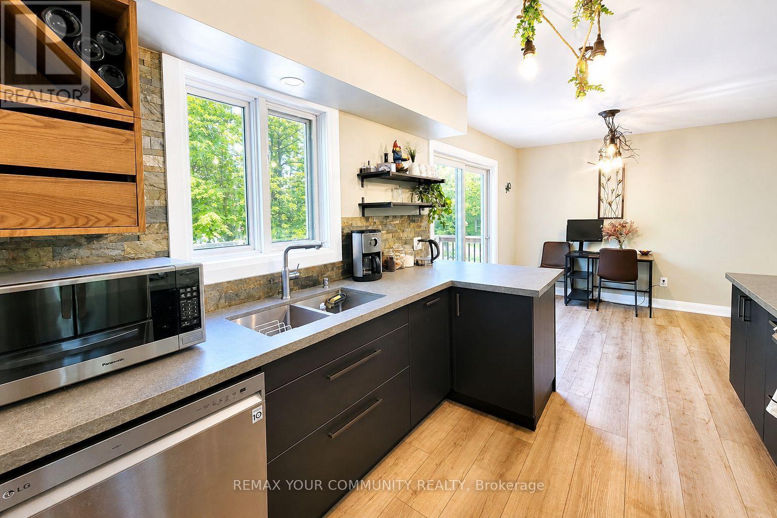 1138 Siesta Drive, Tiny, ON - Indoor Photo Showing Kitchen With Double Sink