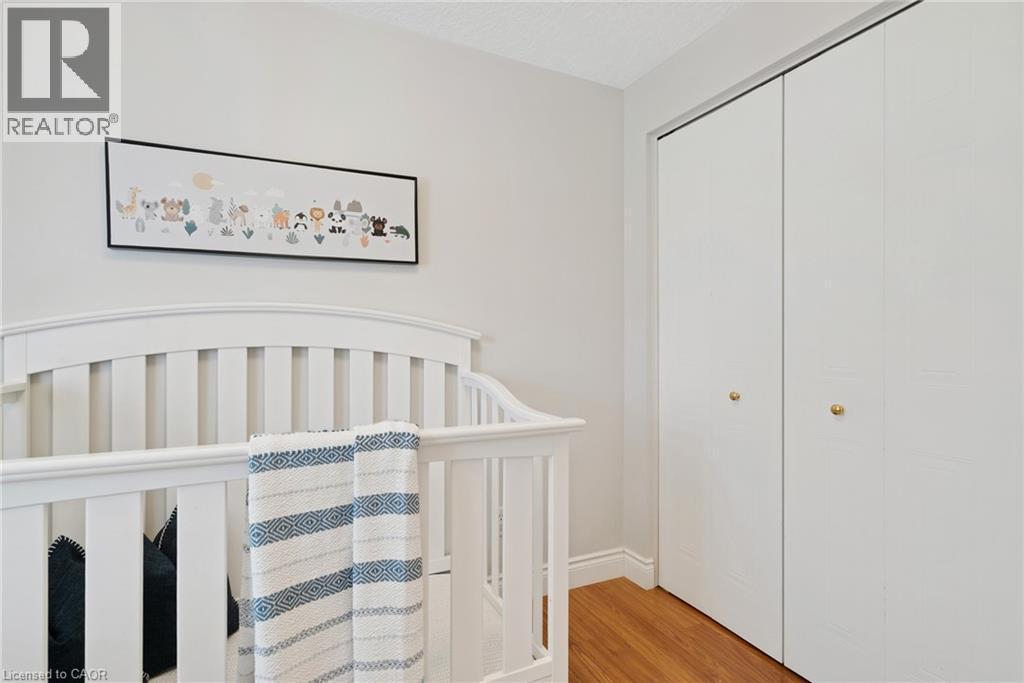 Hardwood-style flooring and light neutral wall colors - 711 Angler Way, Waterloo, ON - Indoor