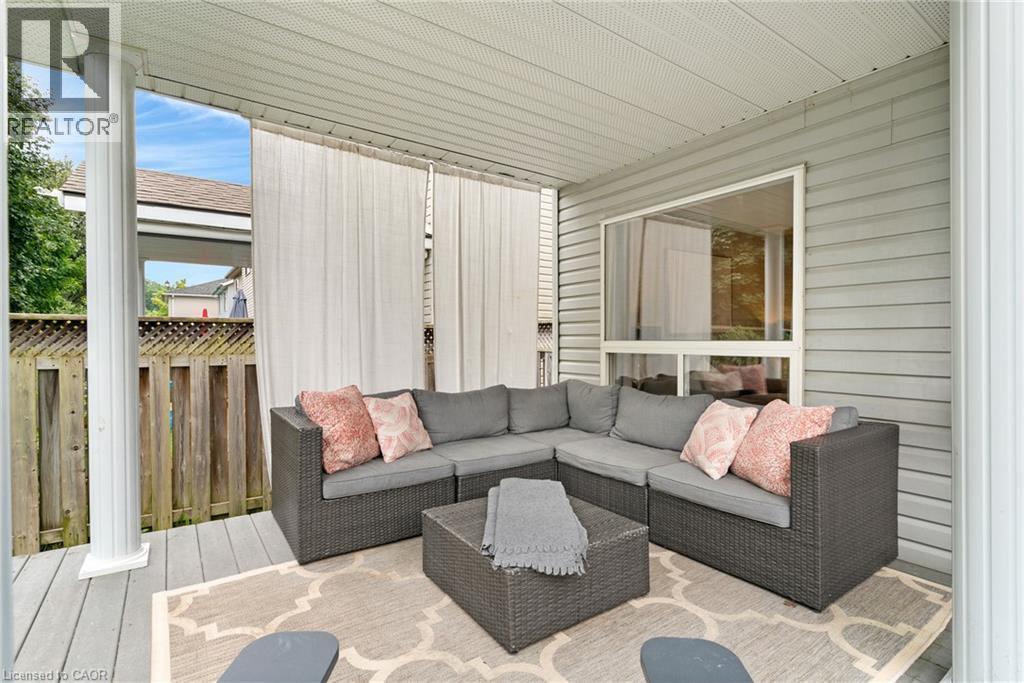Covered deck with composite flooring - 711 Angler Way, Waterloo, ON - Outdoor With Exterior