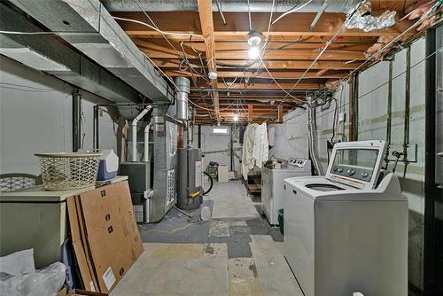 2 Voyageur Ave, Winnipeg, MB - Indoor Photo Showing Basement