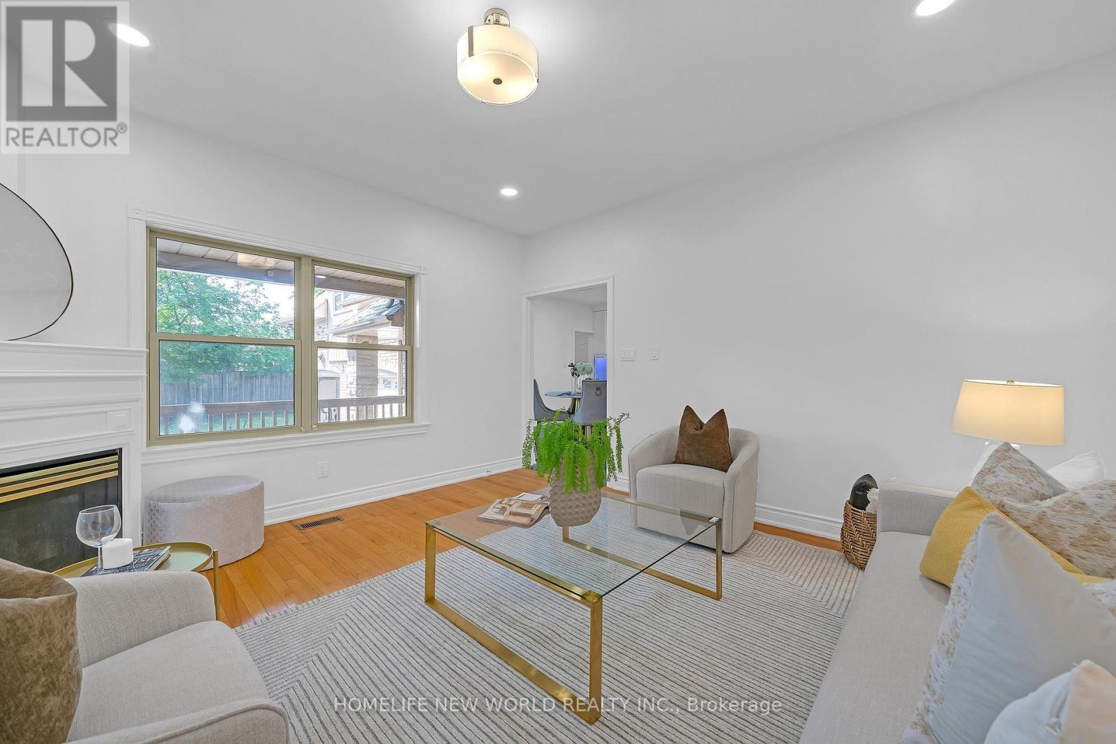 9 Pavillion Street, Markham, ON - Indoor Photo Showing Living Room With Fireplace