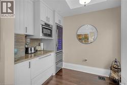 Coffee bar area with Bosch built-in microwave, Forno Wine cooler and built-in Fisher & Paykel freezer drawer. - 