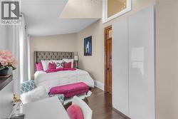 Large windows and soaring ceiling in 2nd bedroom allow the daylight to punctuate the room. - 